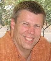 Scott Peterson in front of a tree