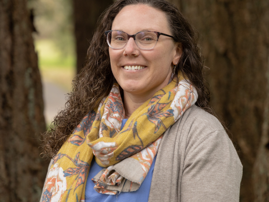 Kelly Hoke in front of trees